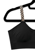 Woven (attached to our black bra)